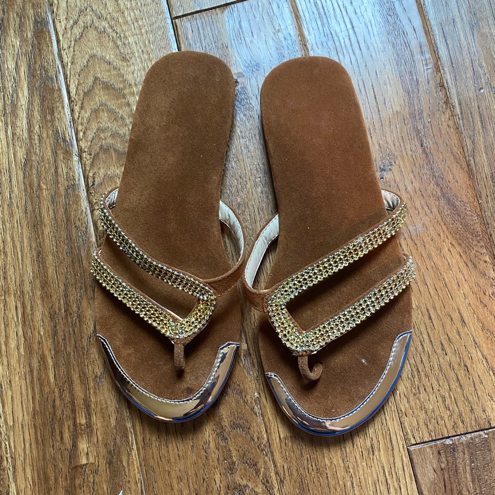 Gold flip flops